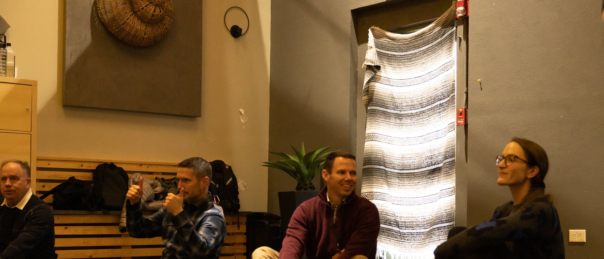 Participants connecting in a small-group breathwork session